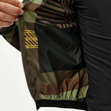 Pas Normal Studios Mechanism Stow Away AOP International Jacke - Grün